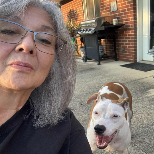 Paw Patrol Dayton's June 2025 Volunteer of the month, Deb, with her cat.